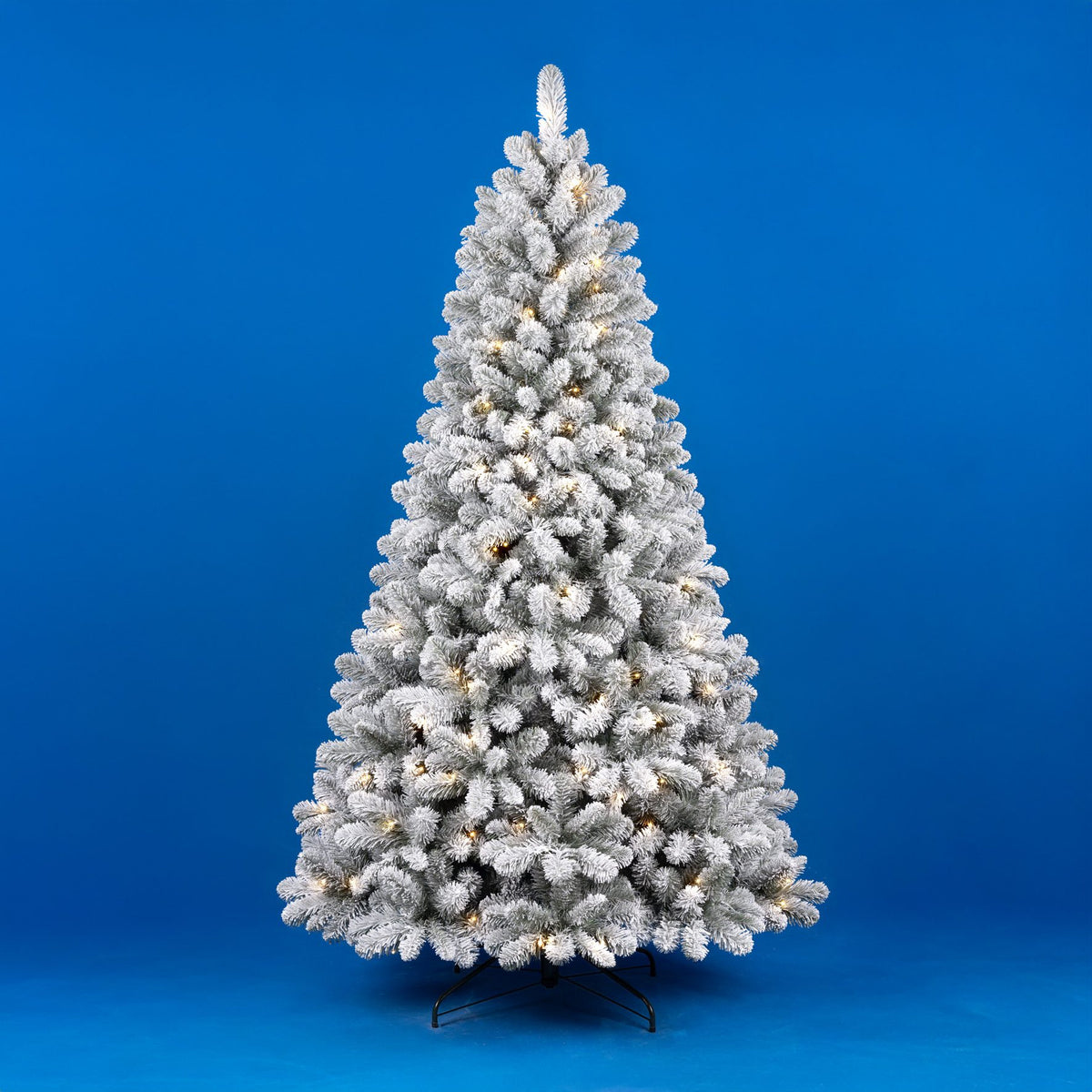 Albero di Natale floccato Colosseo Altezza 180cm Bianco