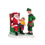 BABBO NATALE CON ELFO E BAMBINO - SANTA UNMASKED