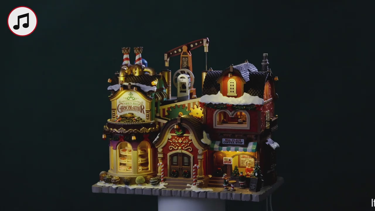 Charger la vidéo : The Holly Jolly Chocolatier &amp; Mrs. Claus Coffee Shop - LEMAX COD. 65521 adattatore (4.5 V) incluso