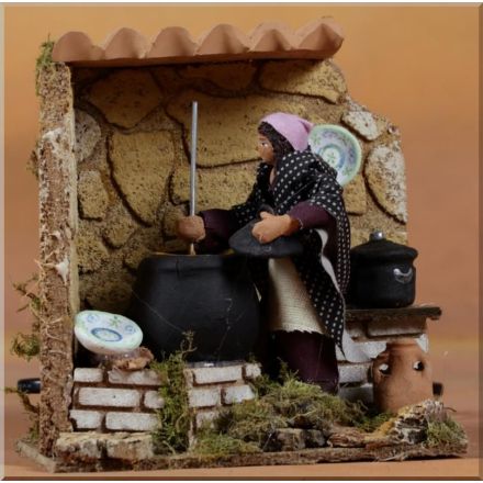 STATUETTA DONNA CHE CUCINA 8CM CON MOVIMENTI 14X9X15CM PER PRESEPE